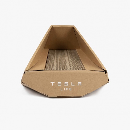 Tesla продает картонную лежанку для кошек