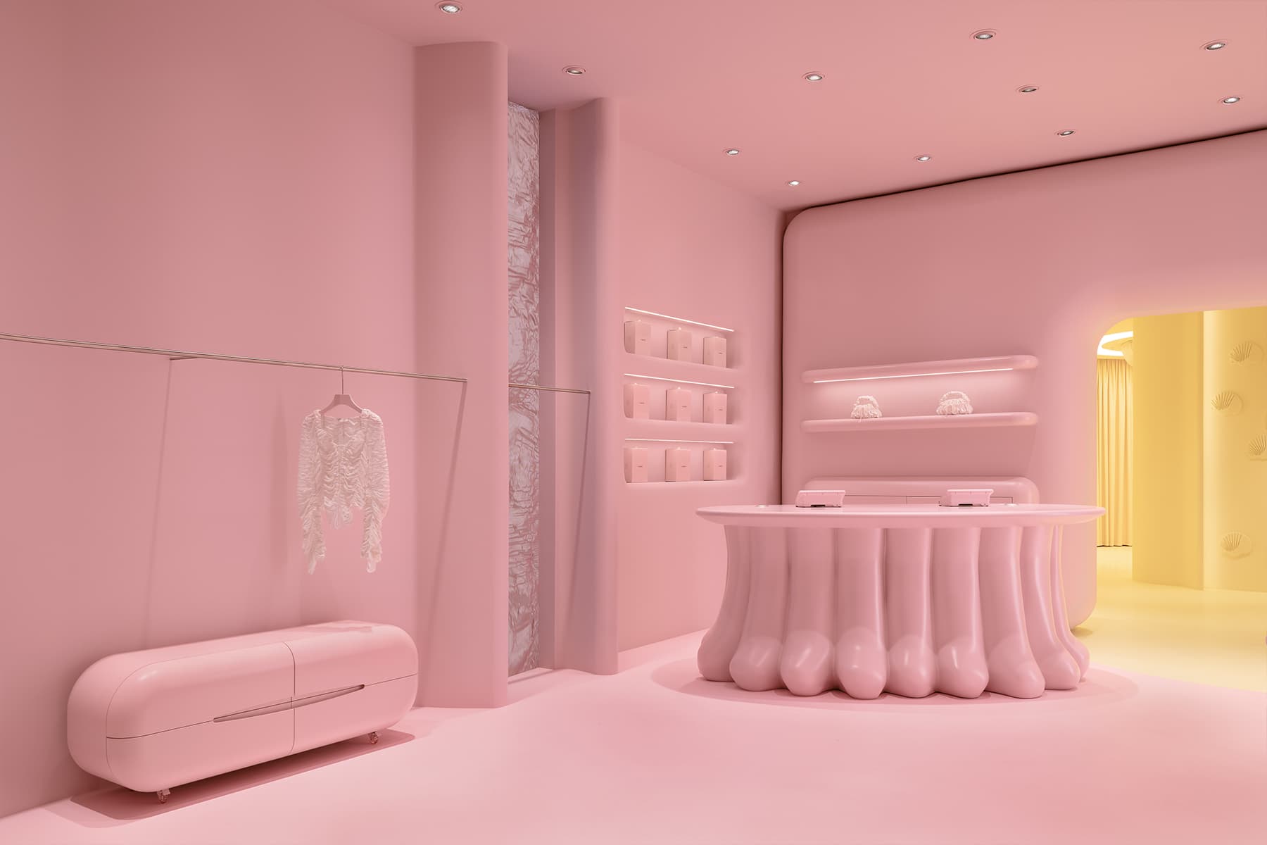 Скругленные формы в фантазийном интерьере шоурума женской одежды — проект MUNO Design