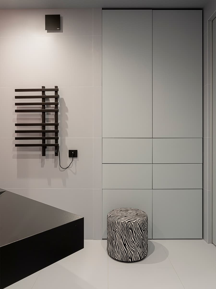 Бетонные потолки, кожа и индустриальные детали в интерьере квартиры для молодого человека — проект Ольги Коваленко