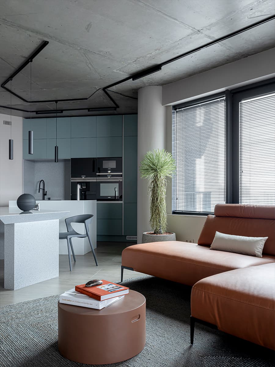 Бетонные потолки, кожа и индустриальные детали в интерьере квартиры для молодого человека — проект Ольги Коваленко