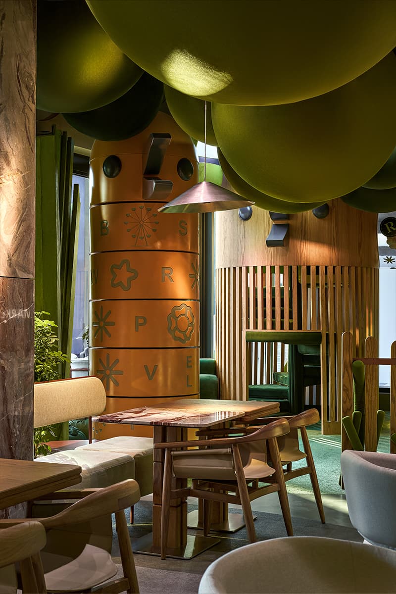 Оазис среди небоскребов: природный интерьер ресторана с игровой зоной — проект DA bureau