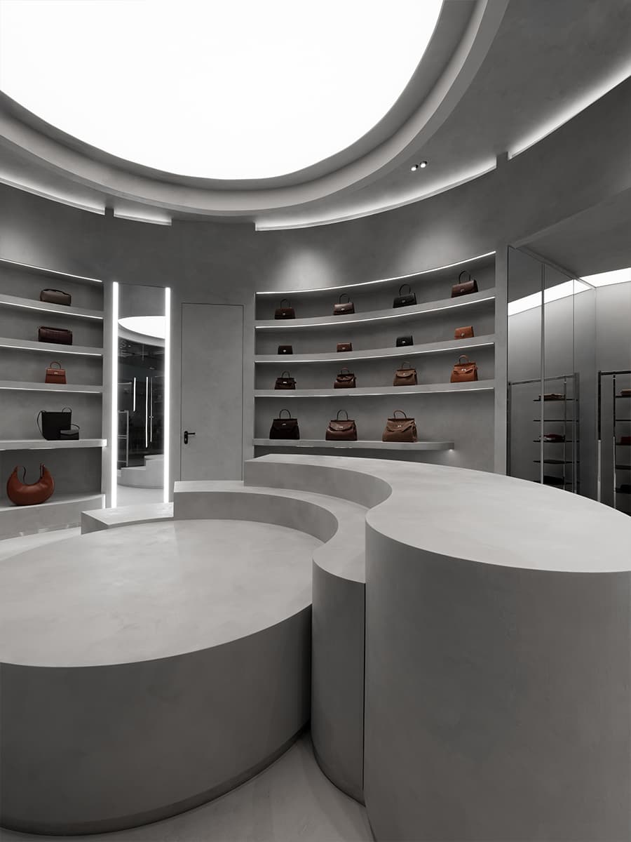 Мономатериал в сдержанном и брутальном интерьере шоурума — проект Александры Бурмистровой