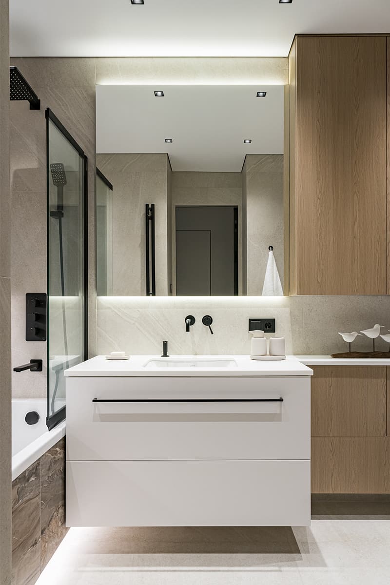 Умиротворяющие краски и теплое дерево в интерьере квартиры для молодой девушки — проект студии Aleta interiors