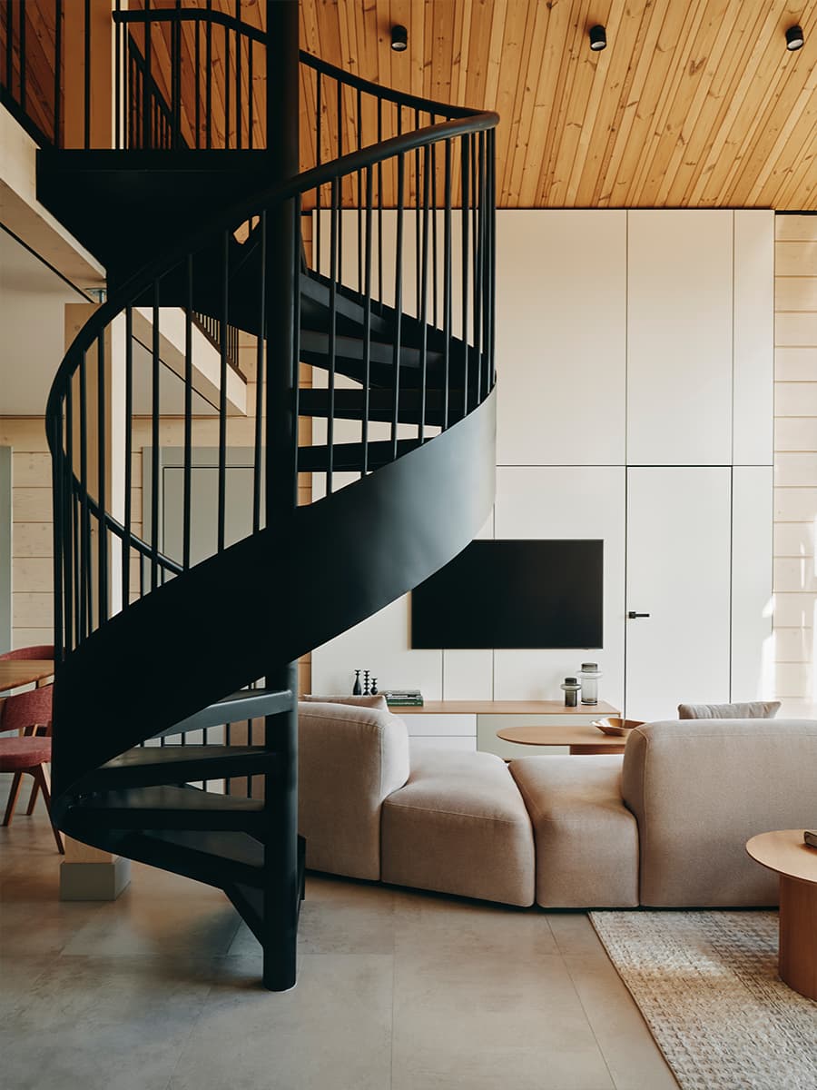 Современный интерьер дачи со скульптурной лестницей — проект VOLVES interiors