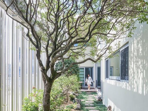 Ar-architects построили дом вокруг дворов в Южной Корее