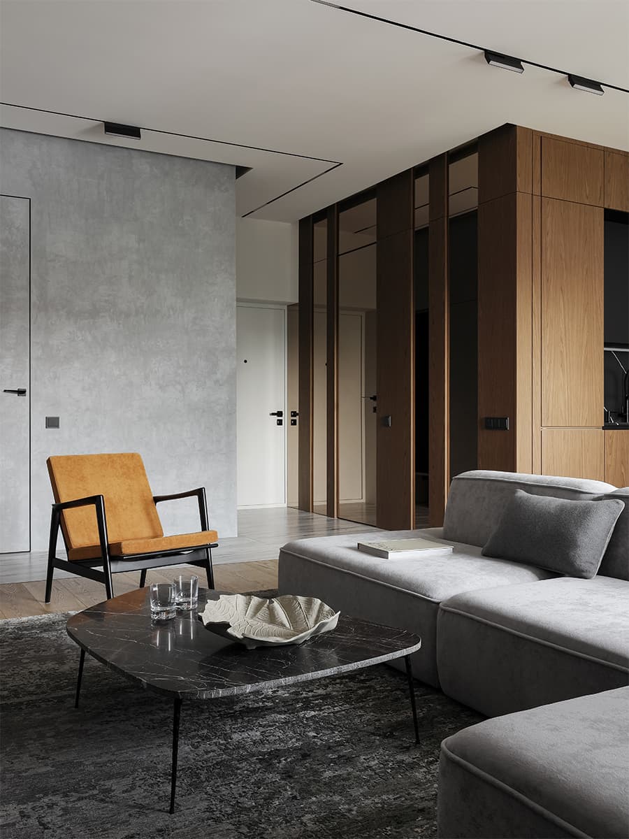 Контрастный интерьер с архитектурным зонированием для любителей путешествий – проект студии A&ES